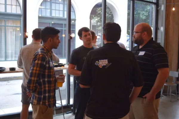 Cofounder Jake Hadden speaking to Demo Day attendees